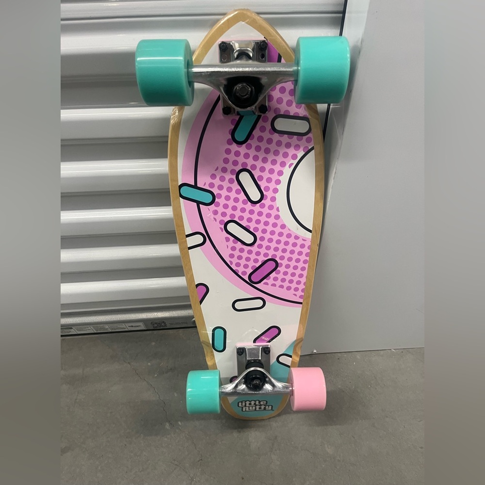 Vibrant Donut Design Skateboard